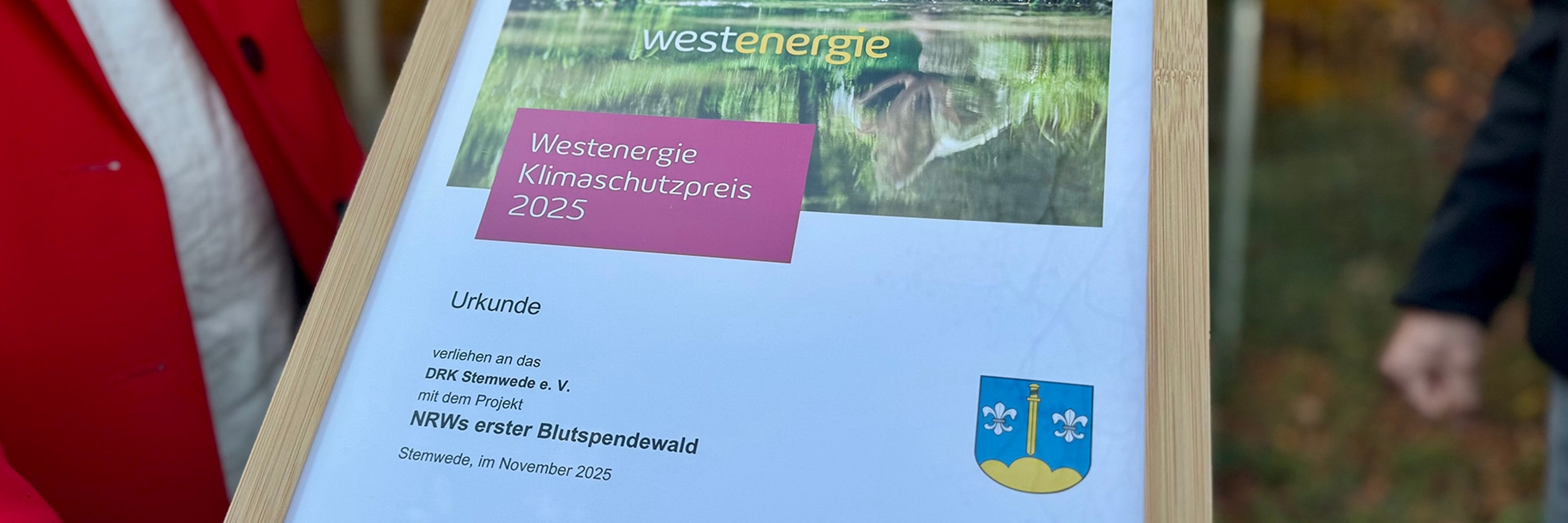 Klimaschutzpreis 2025 Eine Urkunde auf der folgendes zu lesen ist: "Klimaschutzpreis 2025 Westenergie" für den Ortsverband Stemwede des Deutschen Roten Kreuzes.